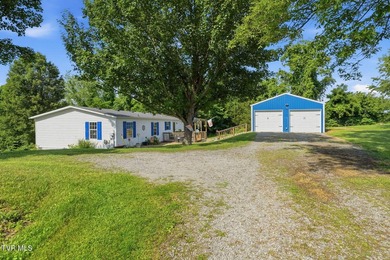 Perched on over 2 acres with breathtaking mountain views, this - photo 10