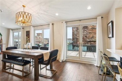 Impressively renovated in 2018, this penthouse-level unit