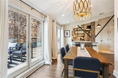 Impressively renovated in 2018, this penthouse-level unit