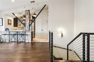 Impressively renovated in 2018, this penthouse-level unit