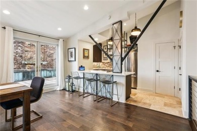 Impressively renovated in 2018, this penthouse-level unit