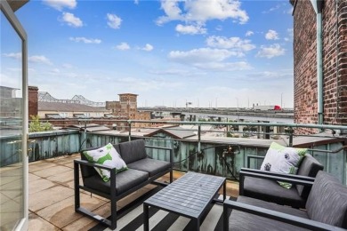 Impressively renovated in 2018, this penthouse-level unit