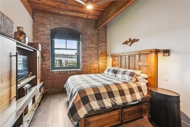 Impressively renovated in 2018, this penthouse-level unit