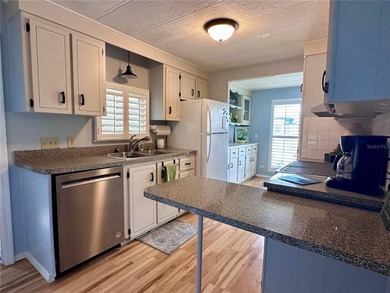 Virtually Staged. Located in a quiet and favorable area within - photo 10