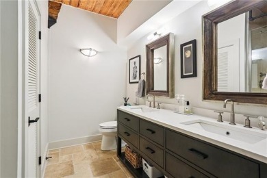 Impressively renovated in 2018, this penthouse-level unit