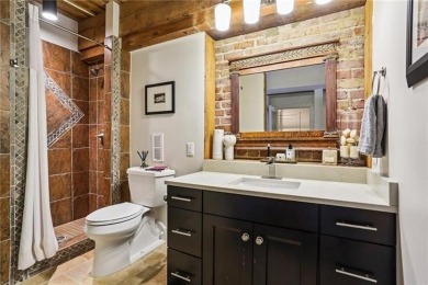 Impressively renovated in 2018, this penthouse-level unit