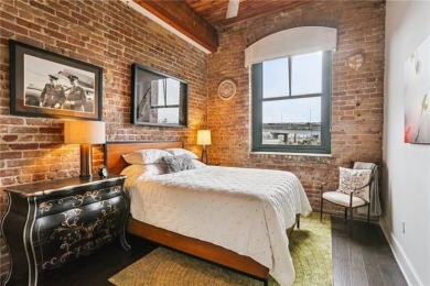 Impressively renovated in 2018, this penthouse-level unit