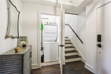 Impressively renovated in 2018, this penthouse-level unit