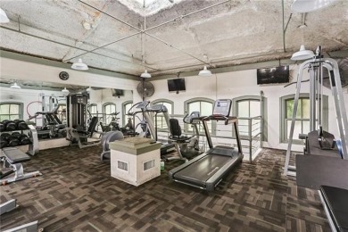 Impressively renovated in 2018, this penthouse-level unit