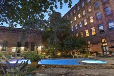 Impressively renovated in 2018, this penthouse-level unit