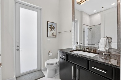 Situated on an oversized lot within the gated community of Azura - photo 13