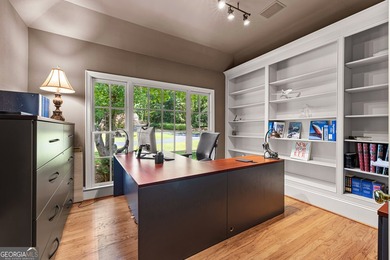 Exceptional custom lakefront home situated on 1.93 private acres - photo 20