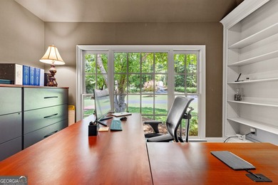 Exceptional custom lakefront home situated on 1.93 private acres - photo 21