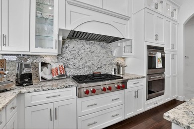 Situated on an oversized lot within the gated community of Azura - photo 21