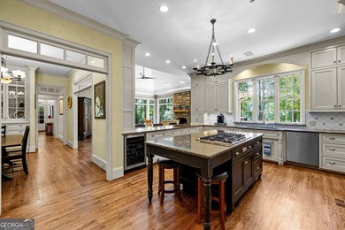 Exceptional custom lakefront home situated on 1.93 private acres - photo 23