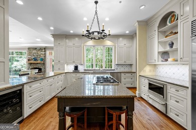 Exceptional custom lakefront home situated on 1.93 private acres - photo 24