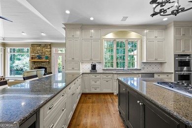 Exceptional custom lakefront home situated on 1.93 private acres - photo 26