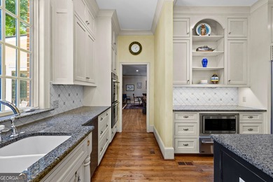 Exceptional custom lakefront home situated on 1.93 private acres - photo 32