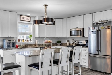 Stunning newer construction waterfront home in sought after - photo 11
