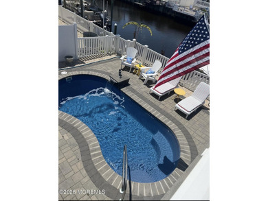 Stunning newer construction waterfront home in sought after - photo 34
