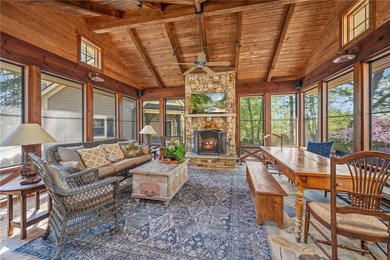This Adirondack-inspired home is gracefully set atop a wooded - photo 14