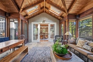 This Adirondack-inspired home is gracefully set atop a wooded - photo 15