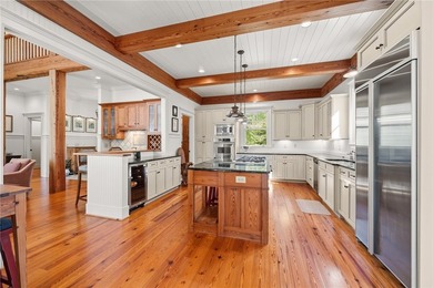 This Adirondack-inspired home is gracefully set atop a wooded - photo 18