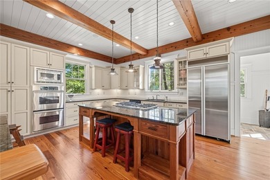 This Adirondack-inspired home is gracefully set atop a wooded - photo 19