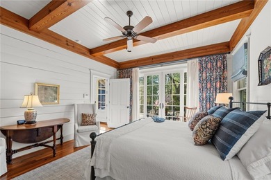 This Adirondack-inspired home is gracefully set atop a wooded - photo 24