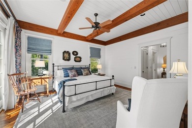This Adirondack-inspired home is gracefully set atop a wooded - photo 25