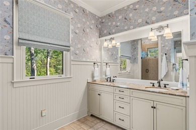 This Adirondack-inspired home is gracefully set atop a wooded - photo 26