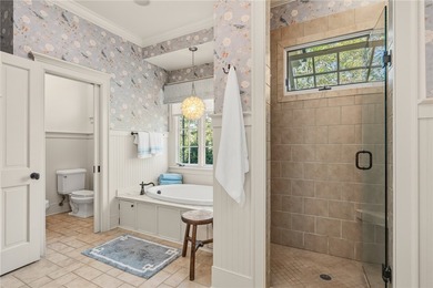 This Adirondack-inspired home is gracefully set atop a wooded - photo 27