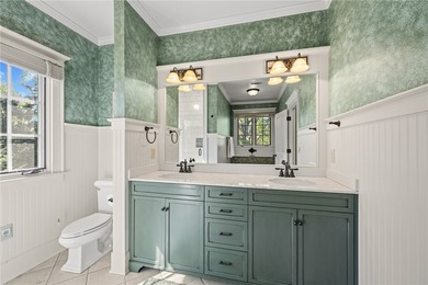 This Adirondack-inspired home is gracefully set atop a wooded - photo 34