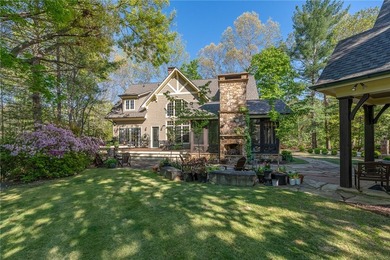This Adirondack-inspired home is gracefully set atop a wooded - photo 37