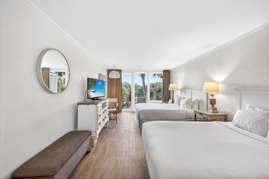 Renovated and rental-ready, this third-floor Bayside at - photo 1