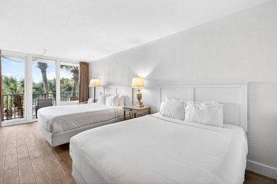 Renovated and rental-ready, this third-floor Bayside at - photo 2