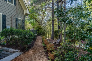 This Adirondack-inspired home is gracefully set atop a wooded - photo 42
