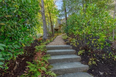 This Adirondack-inspired home is gracefully set atop a wooded - photo 43