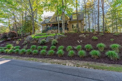 This Adirondack-inspired home is gracefully set atop a wooded - photo 44