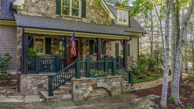 This Adirondack-inspired home is gracefully set atop a wooded - photo 46