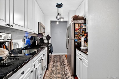 Bright and spacious move-in ready one-bedroom co-op with a - photo 6