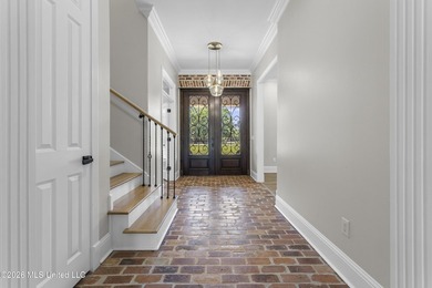 Tucked behind a gated entrance on 5 private acres, this - photo 11
