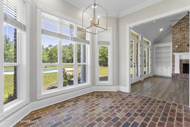 Tucked behind a gated entrance on 5 private acres, this - photo 17
