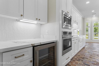 Tucked behind a gated entrance on 5 private acres, this - photo 25
