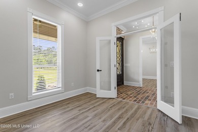 Tucked behind a gated entrance on 5 private acres, this - photo 30