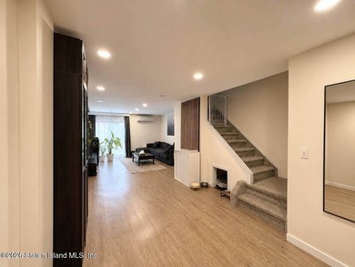 This stunning recently renovated 3 bedrooms duplex condo sits in - photo 3