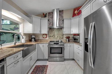 Updated 3-Bedroom Villa with 2-Car Garage in Turnberry Woods at - photo 21