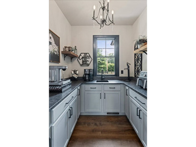 Modern farmhouse meets luxury retreat at this like-new - photo 10