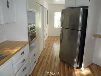 GREAT REMODELED WITH NEW PAINT, FLOORING, ROOF & APPLIANCES - photo 11