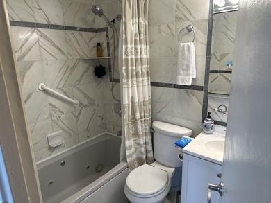 Corner unit with OCEAN AND BAY VIEWS!! Sit on your balcony and - photo 11